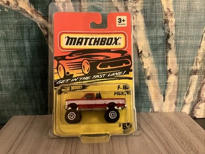 MATCHBOX F -150  RED & WHITE 4X4 FORD F-150 PICKUP NEW ON CARD#65 1994 New Model - Image 1 of 4