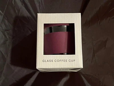 Taza de café de vidrio reutilizable de 12 oz. Taza de vidrio templado y banda de silicona antideslizante. Foto 1 de 3