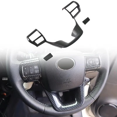 For Toyota Hilux Revo 2016-2025 Carbon Look Interior Steering Wheel Decor Cover - Image 1 of 4