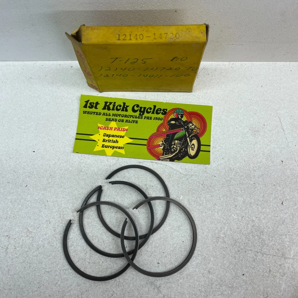 NOS SUZUKI 12140-14720 T125 Piston Ring Set OEM - Image 1 of 1