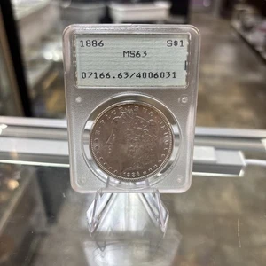 1886 $1 MS63 OGH Morgan Silver Dollar - PCGS Rattler - Picture 1 of 10