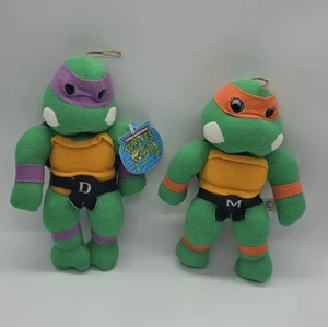Lote de 2 peluches de colección TMNT, 1989 uno con etiqueta Teenage Mutant Ninja Turtles - Imagen 1 de 3