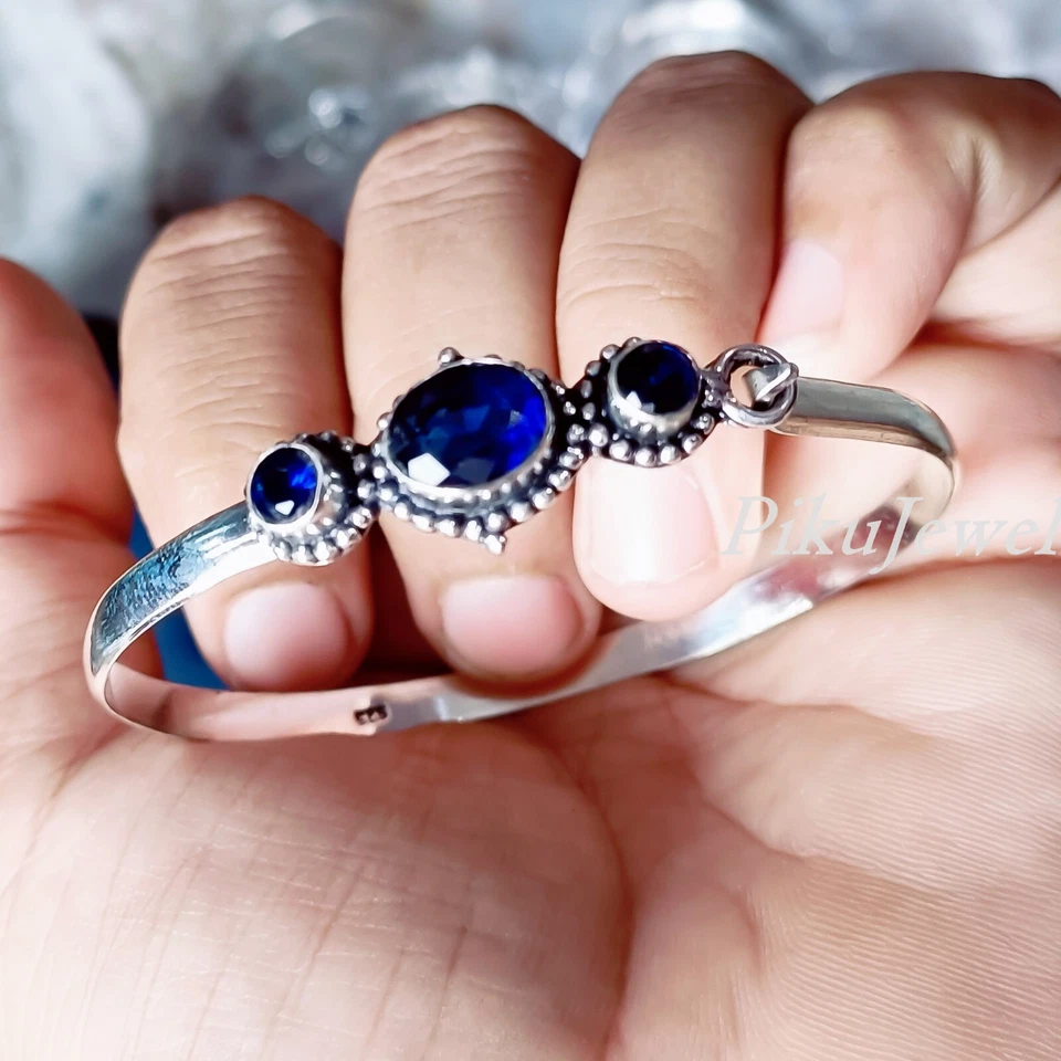 Brazalete brazalete grande de plata de ley 925 con piedras preciosas de talla múltiple de tanzanita azul Foto 1 de 4