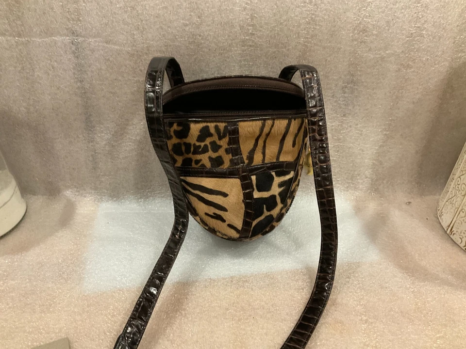 Bolso de mano - Sharif, con una variedad de pieles de gato grande y espalda y correa de reptil Foto 1 de 4