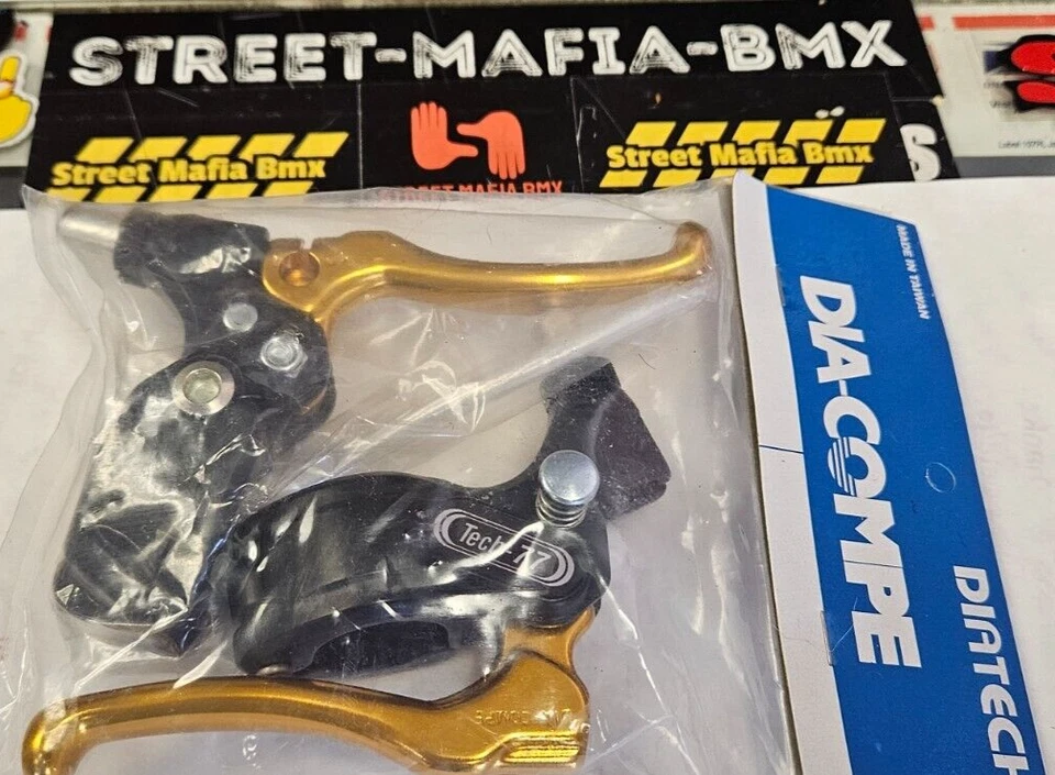 DIA-COMPE TECH 77 LOCKING BRAKE LEVERS SET black/gold Fit BMX FREESTYLE BIKE new - Image 1 of 2