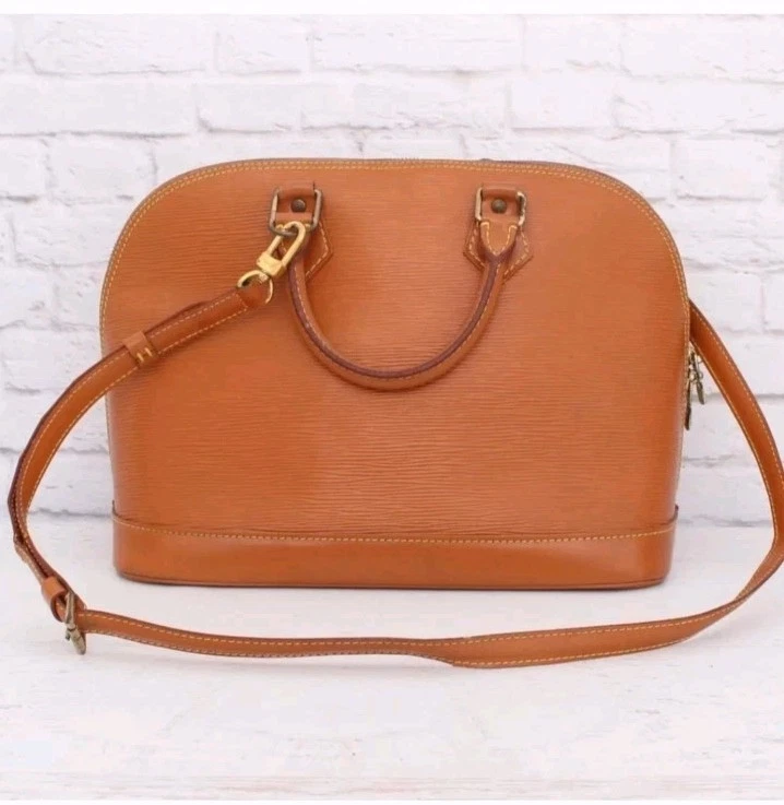 Auténtico Louis Vuitton Alma MM marrón Epi usado en excelente estado con correa extensible Foto 1 de 4