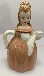 Vintage Tetera Figura Victoriana Dama Sosteniendo Jarra Melocotón Vestido Flor En Cabello - Imagen 1 de 12