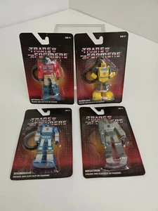 Transformers 4 Figures Backpack Clips Bumblebee Optimus Prime Soundwave Megatron - Picture 1 of 6