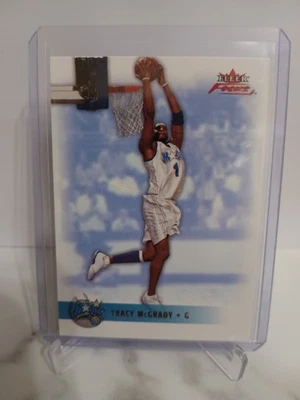 Tarjeta de baloncesto #6 de Tracy McGrady Orlando Magic 2003-04 Fleer Focus NBA  Foto 1 de 3
