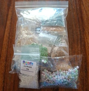 25 BAGS OF ASSORTED SIZES OF SEED BEADS. - Picture 1 of 2