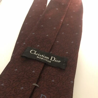 Authentic CHRISTIAN DIOR Paisley Red Design On Maroon Polyester Silk Necktie Tie - Image 1 of 4
