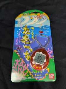 Tamagotchi Discovery at Sea Ocean Clear Red Transparent Amber BANDAI Virtual Pet - Picture 1 of 4