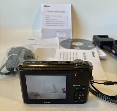Nikon Coolpix S1000pj 5x Zoom Digital Camera / W/Extras! Bundle READ DESCRIPTION - Image 1 of 4