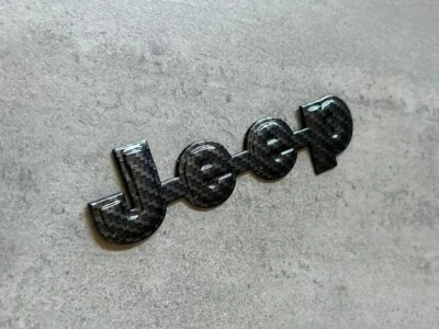Jeep Cherokee XJ 84-96 Black Carbon Fiber Emblem Rear Tailgate Badge OEM Mopar - Imagem 1 de 3
