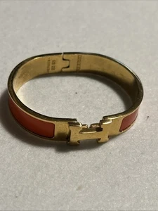Bracciale HERMES Caramello Arancione Smalto Stretto Oro Clic Clac H Senza Scatola - Foto 1 di 9