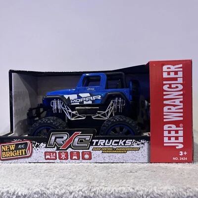 New Bright R/C Motor Sport Blue Jeep Wrangler Lifted Truck - Image 1 of 4