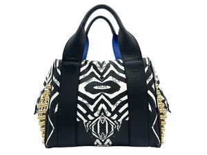 Bolso de mano de cuero MCM bolso de asa estampado de cebra logotipo negro blanco tachuelas - Imagen 1 de 12