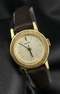 Vintage Seiko Gold Tone Round Minimalist Dainty Ladies Watch Wind Up Classy - Picture 1 of 10
