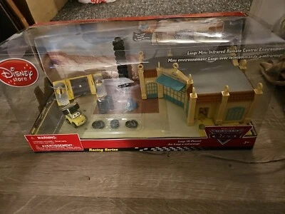 DISNEY STORE EXCLUSIVE WORLD OF CARS LUIGI MINI INFRARED REMOTE CONTROL PLAYSET - Image 1 of 4