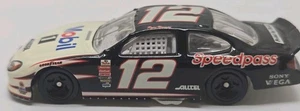 1999 Hot Wheels FORD TAURUS #12 RYAN NEWMAN MOBIL 1 BLACK 1:64 Diecast 3" NASCAR - Picture 1 of 6