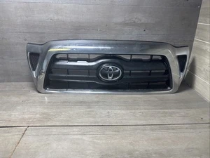 2005-10 TOYOTA TACOMA FRONT BUMPER GRILLE OEM PART# 53100-04390 / 53100-04350 - Picture 1 of 17