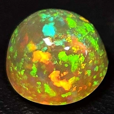 NATURAL AAA+VVS PHENOMENAL COLOR PLAY ROUND CABOCHAN ETHIOPIAN WELO OPAL 1.80CTS - Image 1 of 3