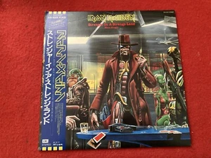 IRON MAIDEN STRANGER IN A STRANGE LAND VINYL JAPAN PRESSING NR MINT OBI & POSTER - Imagen 1 de 19