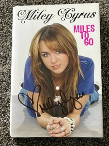 *MILEY CYRUS*SIGNED*AUTOGRAPHED*BOOK*MILES TO GO*1ST EDITION & 1ST PRINT*COA* - Picture 1 of 3