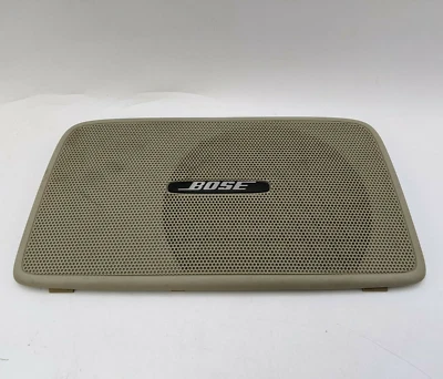 Infiniti I35 2003 2004 Subwoofer central trasero Cubierta de altavoz Rejilla Borde Bronceado Bose Foto 1 de 4