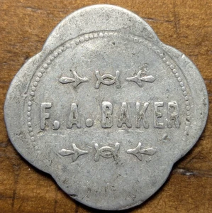1903 Magnolia, Minnesota MN F. A. Baker (tienda) robo bueno para ficha comercial de 5¢ - Imagen 1 de 5
