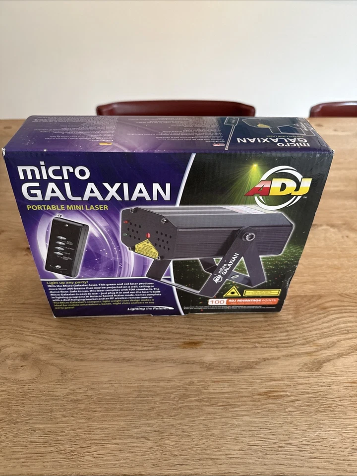 Máquina de luz láser efecto micro galaxiano American DJ ADJ con control remoto Foto 1 de 1