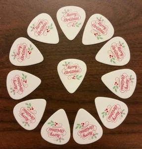 Frohe Weihnachten Gitarren-Plektren (12 Plektren) - (2 kaufen, 50 % sparen auf 2.) - Bild 1 von 1