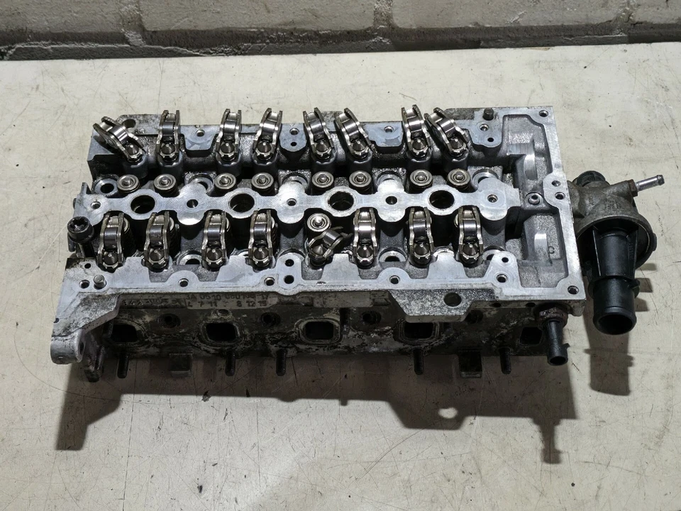 Cylinder head 5518859S Opel Meriva 1.3 CDTI DPF 55 KW 75 hp 202674 km - Image 1 of 4