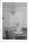 vintage photo Halloween surprised little boy at table look inside carved pumpkin