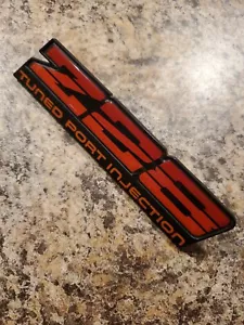 85 87 Camaro Z28 Tuned Port Dash Emblem 14082961 all studs good! 82 92 - Picture 1 of 2
