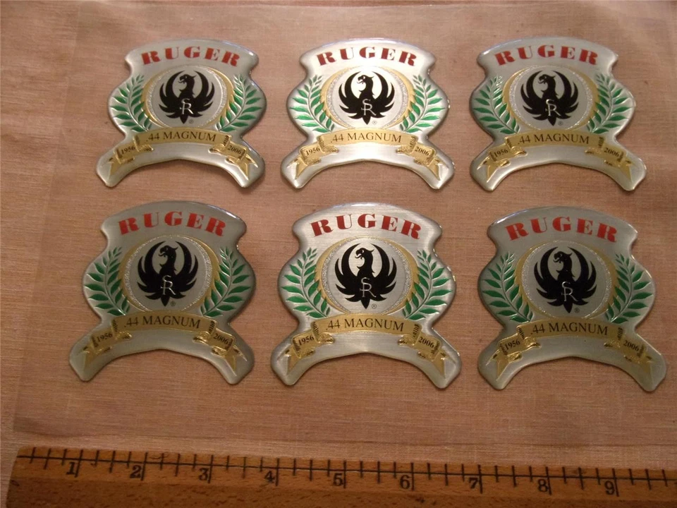 SIX RUGER 44 MAGUM 50 YEAR PLASTIC COATED METALLIC DECALS - Image 1 of 1