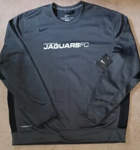 Neu mit Etikett Nike Michigan Jaguars FC Fußball Therma-Fit Pullover Sweatshirt - Größe 2XL - Bild 1 von 4