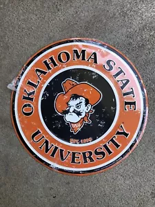 OKLAHOMA STATE COWBOYS 12" RUNDES METALLSCHILD OSU UNIVERSITÄT MANN HÖHLE SPIELZIMMER - Bild 1 von 1