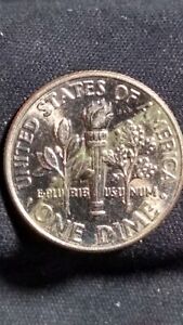 2018 D US 10cent Roosevelt Dime w/ clad layer partially missing on reverse side.