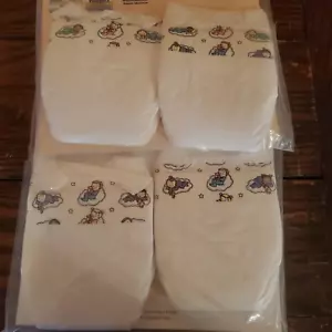 4 Vintage 1990s (1992/1993/1994) PAMPERS Plastic Crinkly Sleeping Cloud Babies - Picture 1 of 7