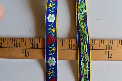 JACQUARD MULTI  FLOWERS ON BLUE TRIM  3  YARDS  X 5/8  INCHES WIDE - Image 1 of 2