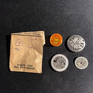 Lotto Orologiai - Piastra FHF Tugaris, Bilanciere NOS Ronda, Ricambi da Riparazione - Foto 1 di 2