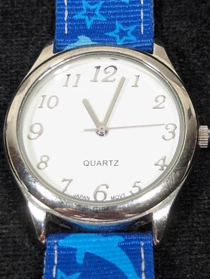 Reloj esfera blanca redondo tono plata caja azul delfín lona 7,25 pulgadas Foto 1 de 4