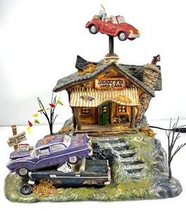 Department 56 “Rusty's Used Cars” Halloween Village Dealership Lit House #808965 - Picture 1 of 12