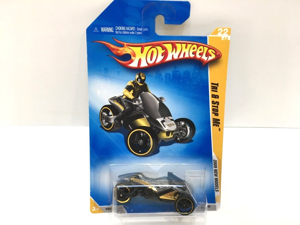 Vehículo todo terreno Hot Wheels New Models Series Tri & Stop Me 2009 dorado/negro/plateado #22 de 42 Foto 1 de 4