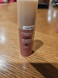 Loreal Paris Lumi Le Glow Highlighter Stick #630 Glowy Creme Chic - Bild 1 von 2