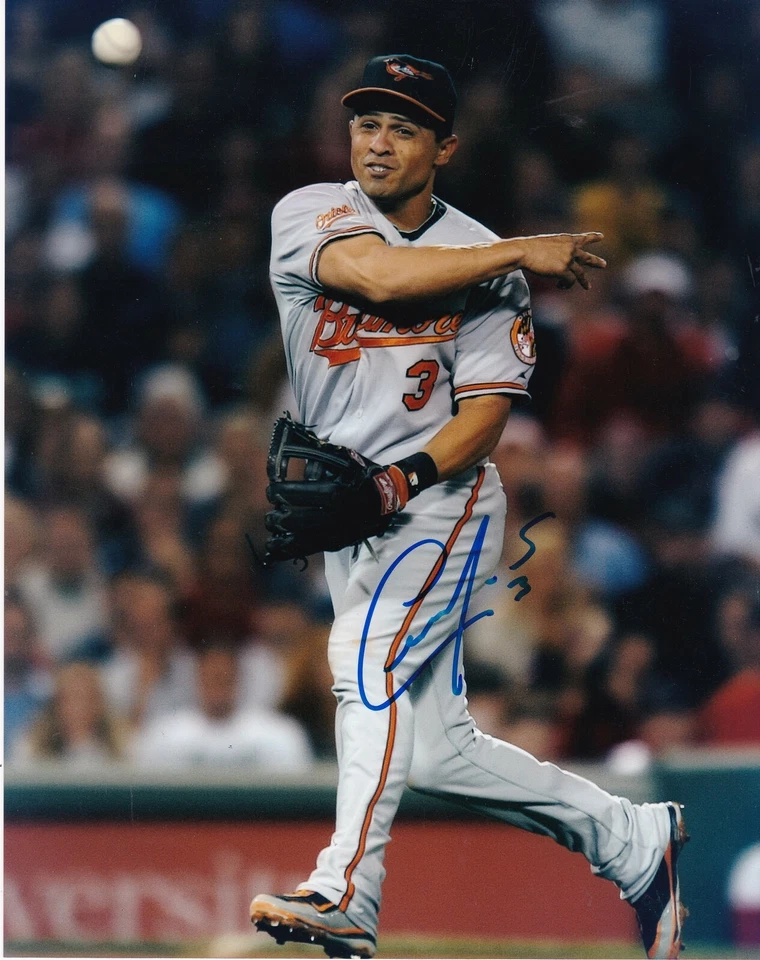 CESAR IZTURIS BALTIMORE ORIOLES ACCIÓN FIRMADO 8x10 Foto 1 de 1