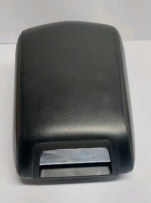 Lincoln MKT 2018 consola central reposabrazos cuero negro carbón OEM usado.  Foto 1 de 3