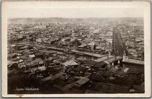 Postcard RPPC c1920s Yokohama Japan Birds Eye View Shops Signs River Boats - Bild 1 von 2