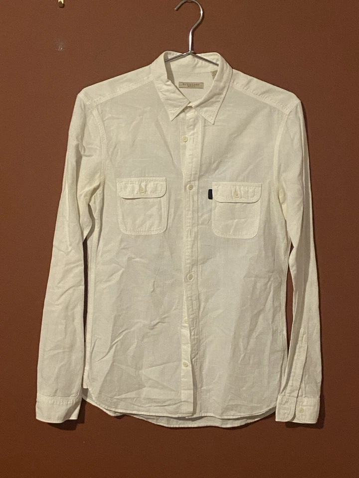 Camisa informal Burberry Brit para hombre de lino blanca con botones manga larga Foto 1 de 4